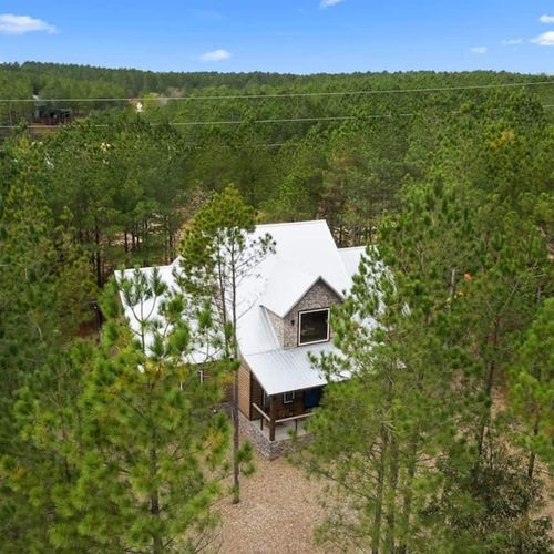 Surrounded by towering pines!