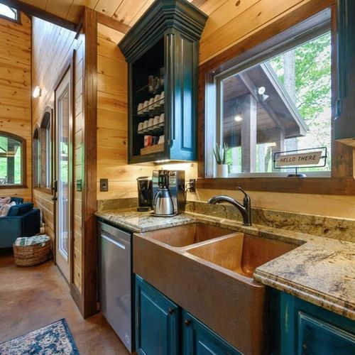 The kitchen is equipped with updated appliances and views to the back yard!