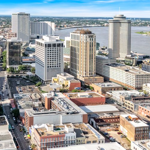 Wake up to sweeping aerial views of a vibrant, walkable city neighborhood.