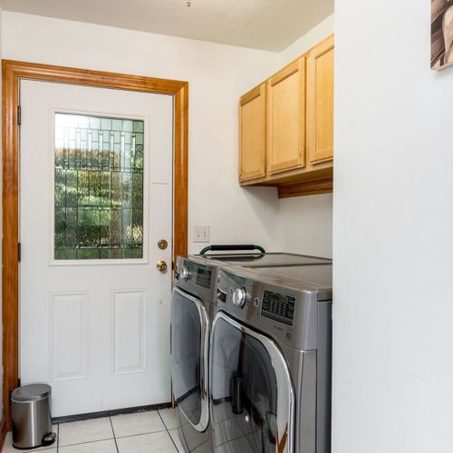 Laundry room:  the home has a very convenient main floor laundry room with a newer front load washer and dryer.