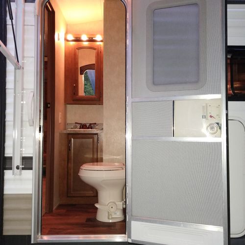 Exterior:  the little half-bath that is conveniently available to enter into without entering the rest of the property.