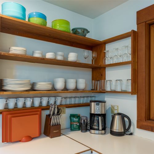 Drip Coffee, French Press, and a selection of teas and sweeteners are provided.