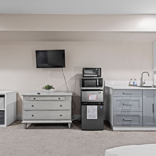 Unwind and enjoy your favorite shows on the flat-screen tv.