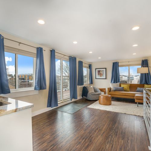 Escape to our third-floor sitting area, which opens up to a stunning rooftop deck!
