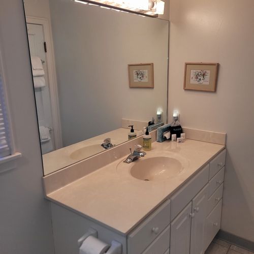 Bathroom #1 (main floor):  full bathroom with a combination tub and shower.
