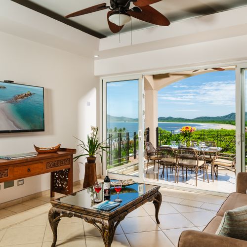 Living room that steps out onto the balcony