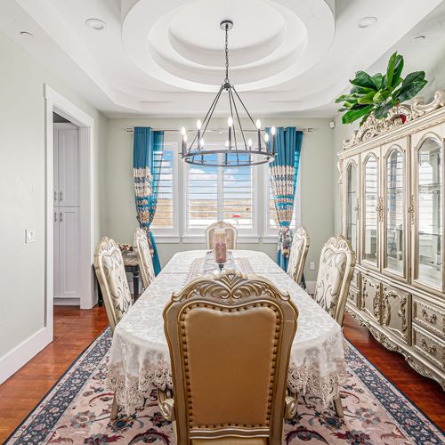 Spacious dining area where modern lines meet natural light