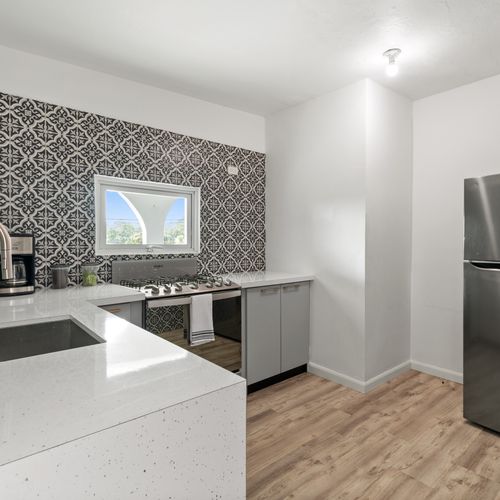 A well-designed kitchen, perfect for preparing meals during your stay.