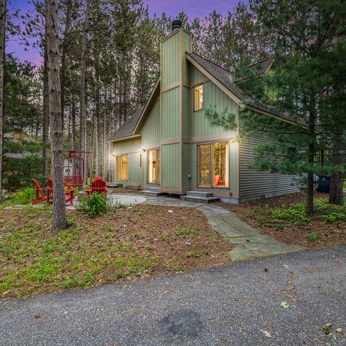 OVERALL:  The front of the cabin in the evening