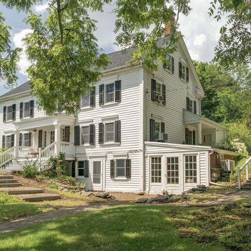 This stately home exudes classic, colonial charm.