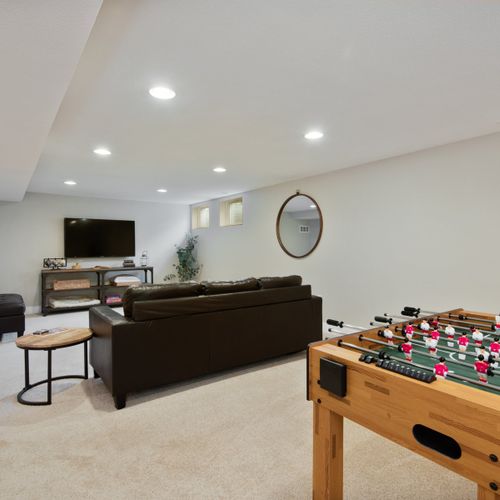 Bring the fun home with a variety of board games and a foosball table in the downstairs living room.