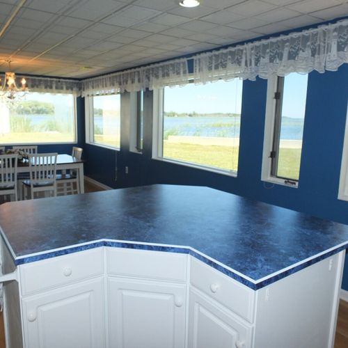 Kitchen:  another angle, highlighting  the island in the kitchen and the views of lake huron.