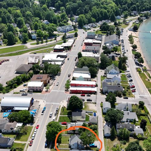 OVERVIEW:  Aerial photo with Crystal Lake, the public boat ramp, public fishing pier, Beulah Public Beach and downtown Beulah in the background.