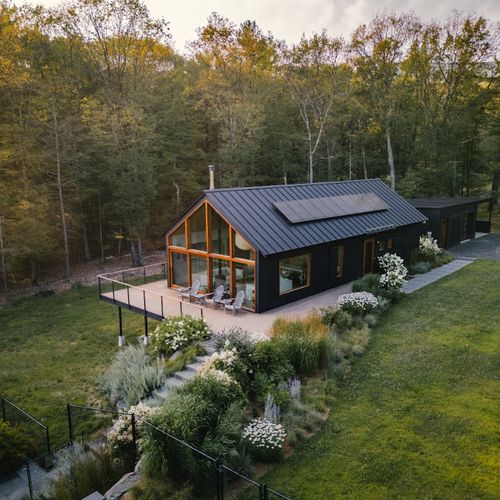 View of the main house, carport, and deck