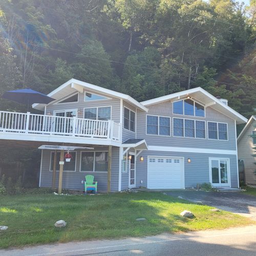 OVERVIEW:  The front of the cottage, with the large second story deck highlighted.