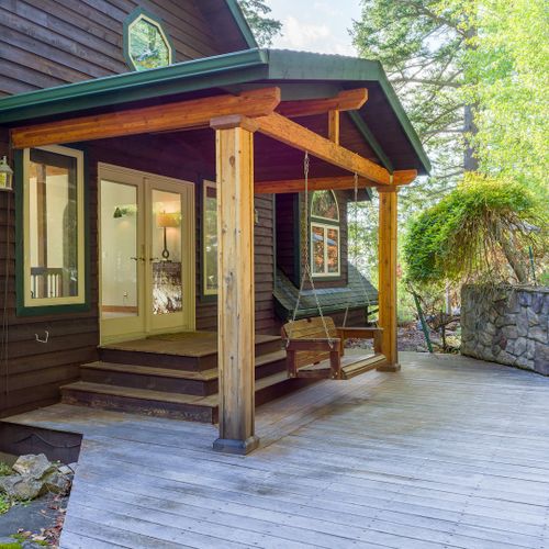 Gardens and decks with seating surround the house.  You can walk the paths and explore the property.