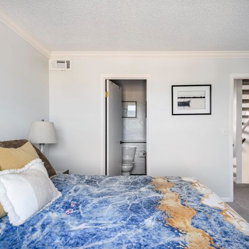 Enjoy the convenience of an attached bathroom in the main bedroom for added privacy.