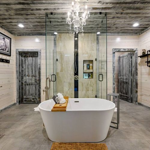 The bathroom has an oversized soaking tub as well as a walk-in shower.