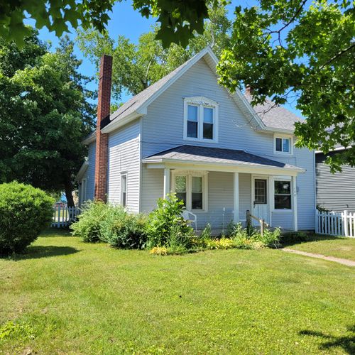OVERVIEW:  The front yard (that is fully fenced-in) and the front of the house
