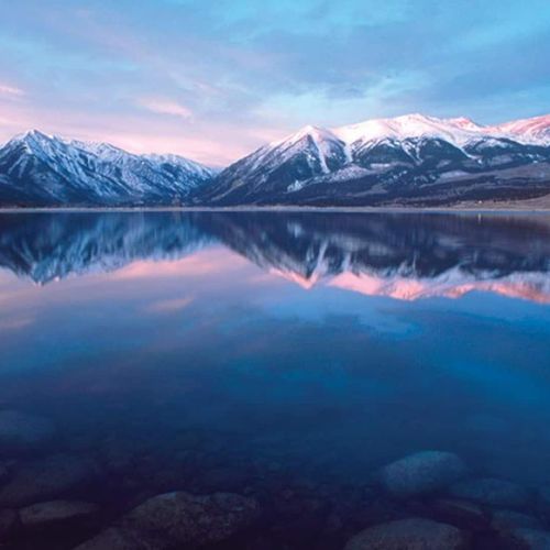 Find your peace amidst the tranquil lakes and towering mountains