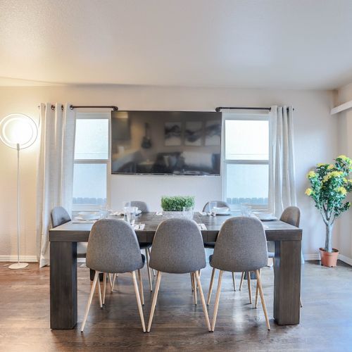 Dine in style beneath natural light and minimalist charm.