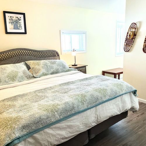 Bedroom #5 (lower level):  this is a very large bedroom with a king-size bed, sofa, closet, and dresser.