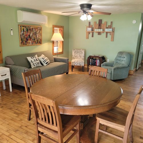 Dining room:  the dining room with the living room in the background.
