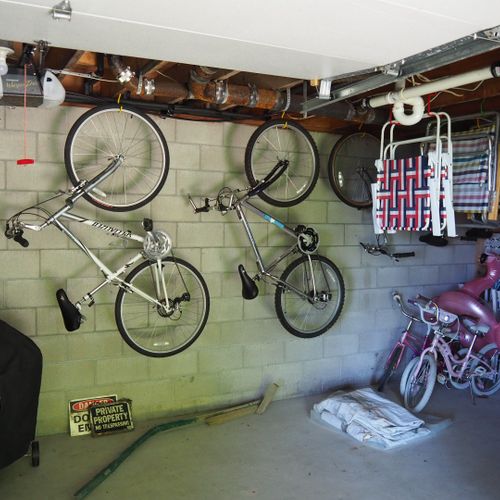 Exterior:  bikes, beach chairs, and a charcoal grill are available in the garage