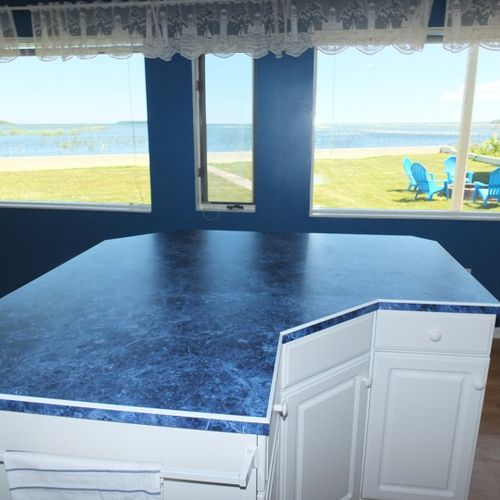 Kitchen:  another angle, again highlighting the island the view of lake huron.