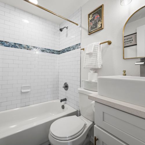Crisp design meets function in the clean-lined bath-shower combo.