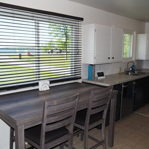 Dining area:  the home has a cute little dining area next to the kitchen that also a good view of manistee lake.
