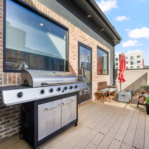 Deck with bbq setup for easy outdoor cooking.