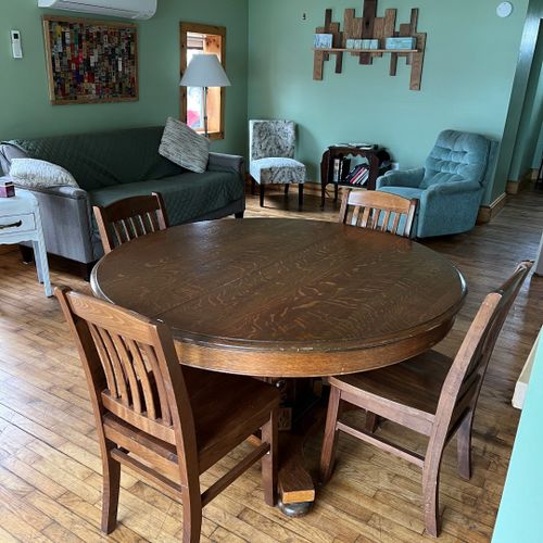 Living room and dining area:  very cute and cozy living room and dining area with a sofa, comfy chairs, dining table and chairs for 4 adults, ceiling fan, television with satellite tv, and a great view of turk lake!