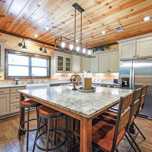 The kitchen comes with an oversized island that seats an additional 7.