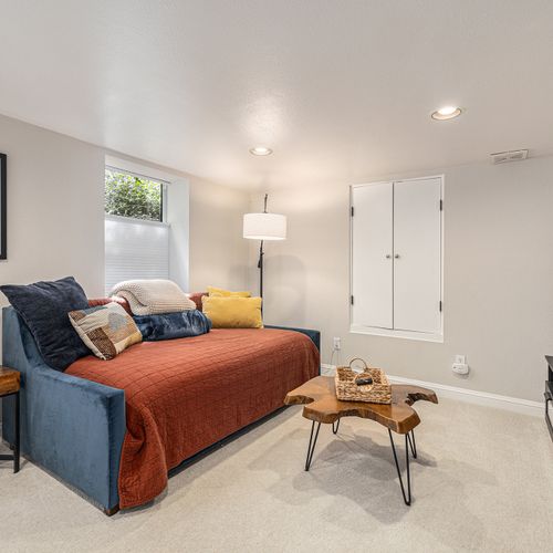 Versatile basement space perfect for relaxation and entertainment