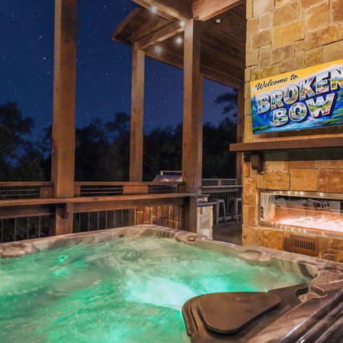 Savor the forest views from your private hot tub oasis, the perfect spot to watch the sun dip behind the trees!