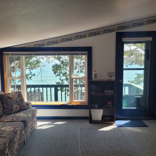 Main room:  the window to the lake and the entrance to the apartment