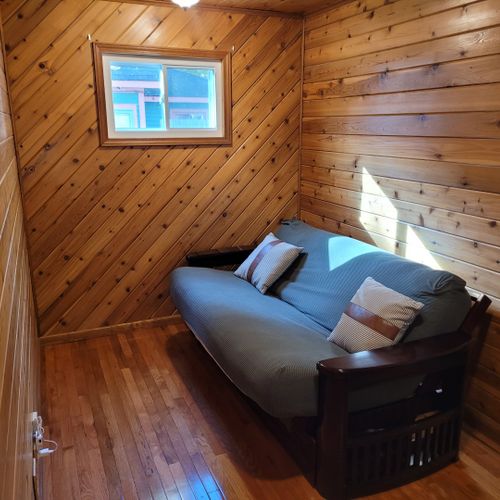 Foyer:  there is a foyer / second living room near the back of the house that has a futon in it.