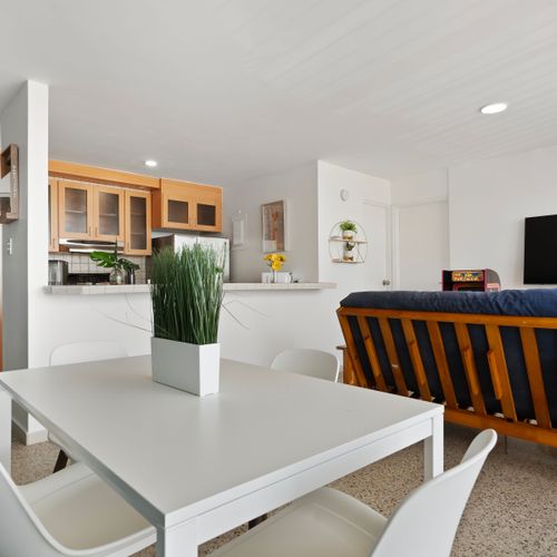Fully equipped kitchen and charming dining area. Perfect for shared meals and connecting.
