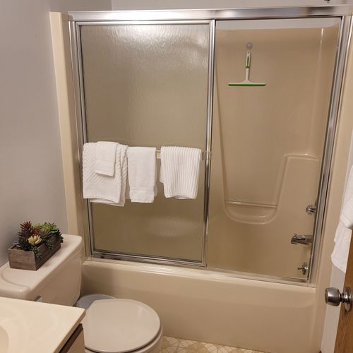 Bathroom #2:  common full bathroom with a combination tub and shower.