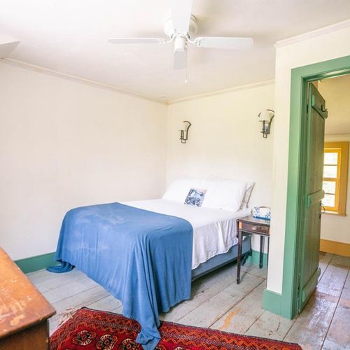 2nd floor back guest bedroom with full sized bed.