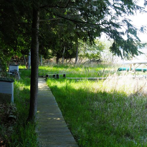 Exterior:  the private lakefront on long lake