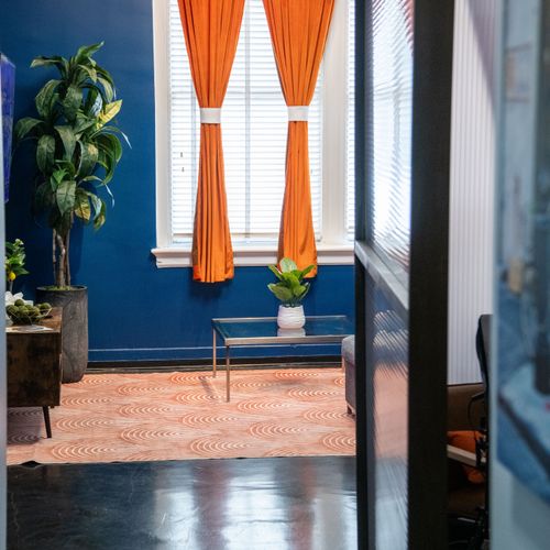 Sun-soaked living space bursting w/ color, tropical greenery & New Orleans soul.