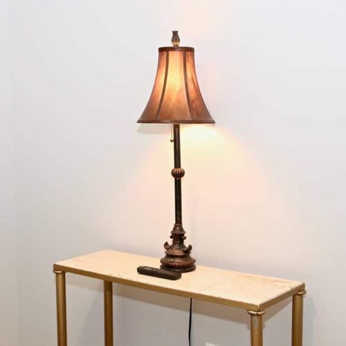 Warm bedside lamp casting a cozy glow — perfect for winding down.