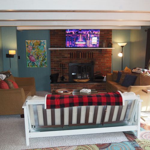 Living room:  the chalet has a super comfy living room with a sofa, loveseat, futon, coffee table, wood fireplace, and large live-streaming tv with roku.