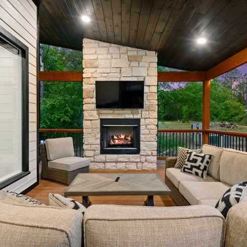 The outdoor sectional around the gas fireplace!