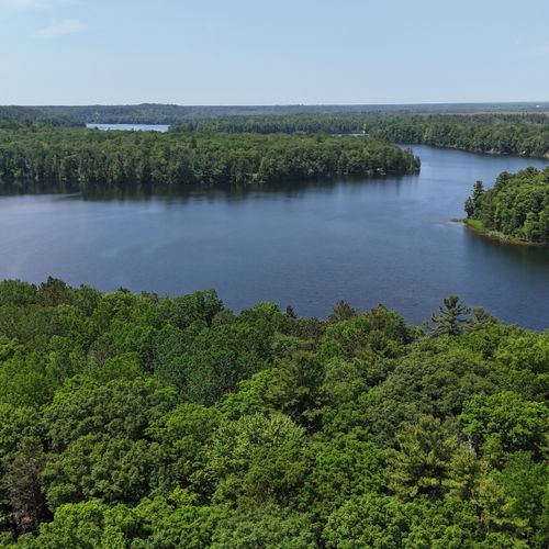Overall:  the gorgeous au sable river behind the property. (this is an aerial photo taken from above the cabin. )