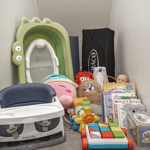 The  downstairs closet is thoughtfully stocked with baby essentials and toys, ensuring that your little ones have everything they need for a comfortable and enjoyable stay!