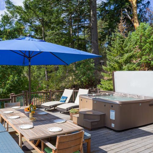 Hot tub and sun loungers make this deck especially enjoyable