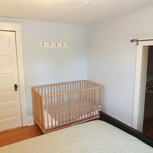 Bedroom #2 (second floor):  this bedroom features a queen-size bed, large closet, nightstands, lamps, and a baby crib! It is on the second floor.